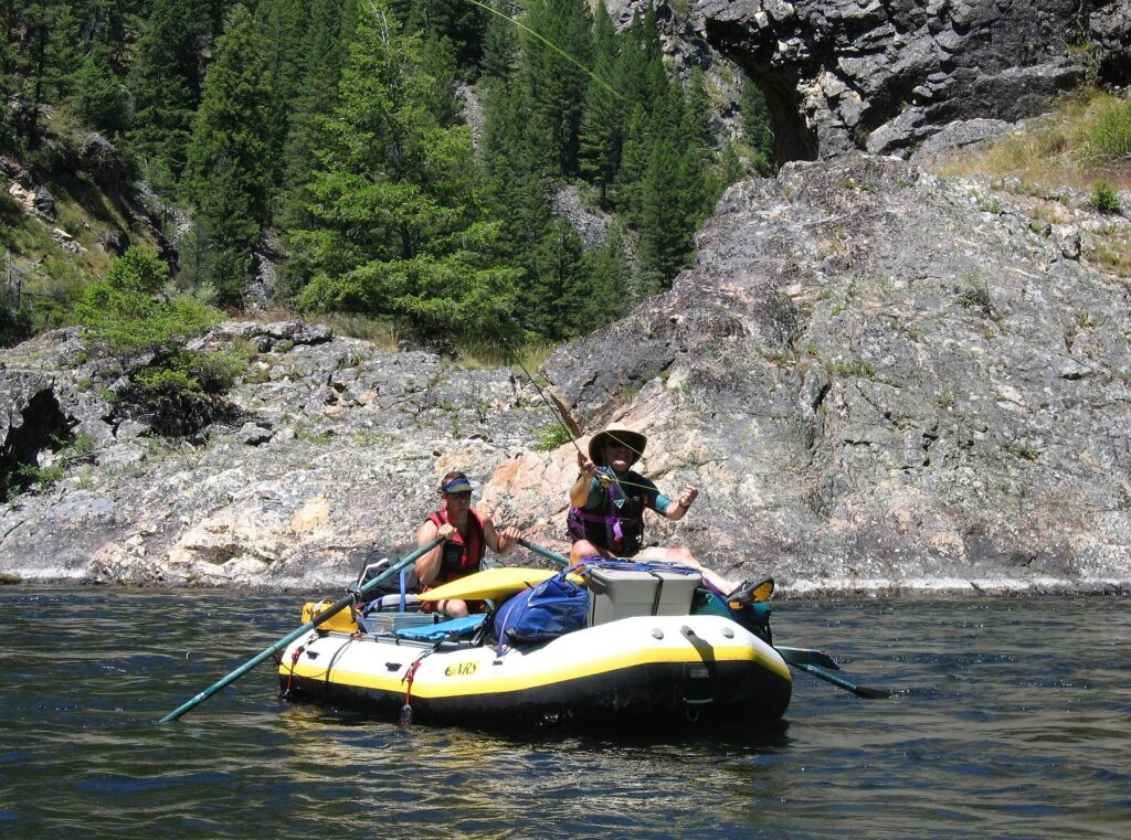 during a heli-float fishing trip tal-adventure lodge patrons row down the talachulitna river