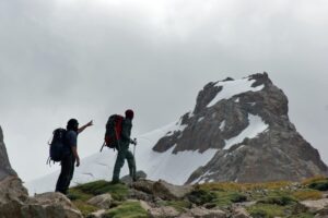 heli hiking trip participants climbing a glacier with tal-adventures lodge during a alaska helicopter tour