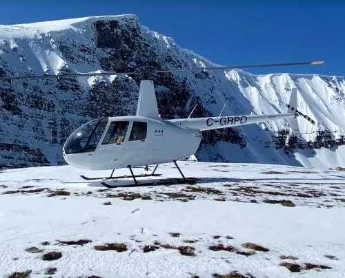 tal-adventures lodge helicopter atop triumvirate glacier, the second largest in alaska