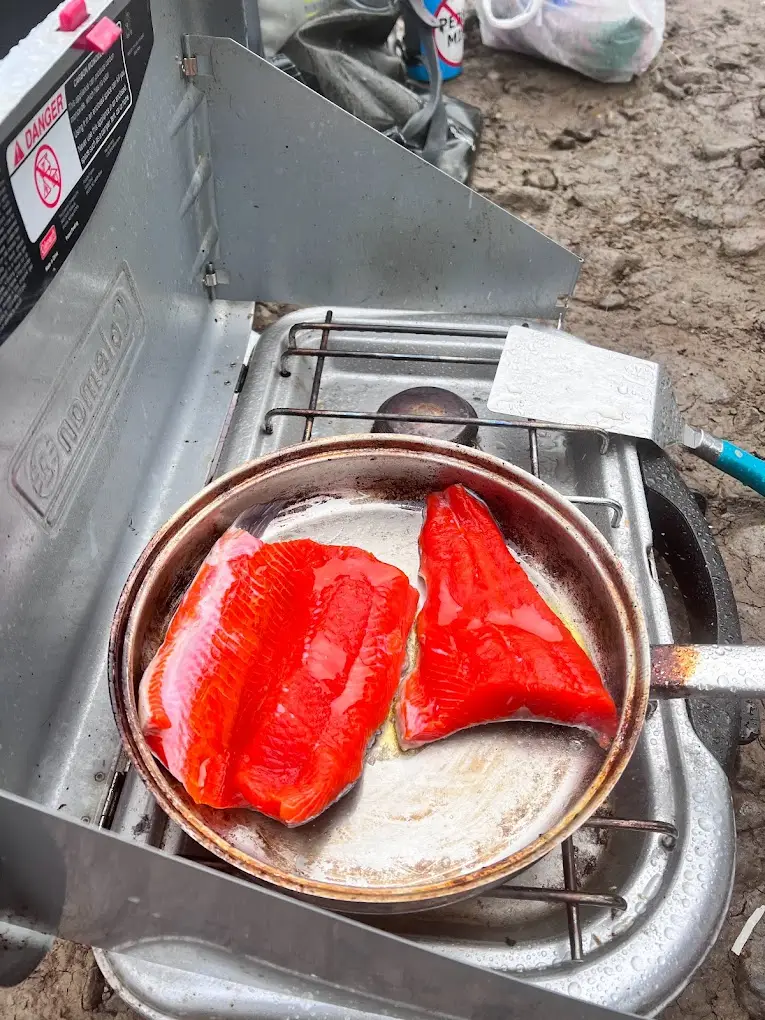 Freshly Cooked Salmon during a trip  to Alaska on a heli-float fishing trip with Tal-Adventures Lodge