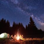 remote camping in alaska with northern lights