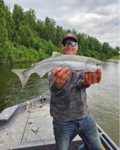 silver salmon caught during tal-adventure lodge's jet boat fishing package in alaska