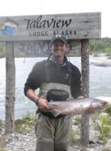 tal river lodge client holding big fish caught on the talachulitna