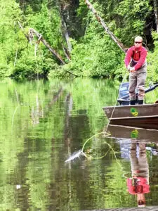 man jet boat fishing in alaska with tal-adventures lodge