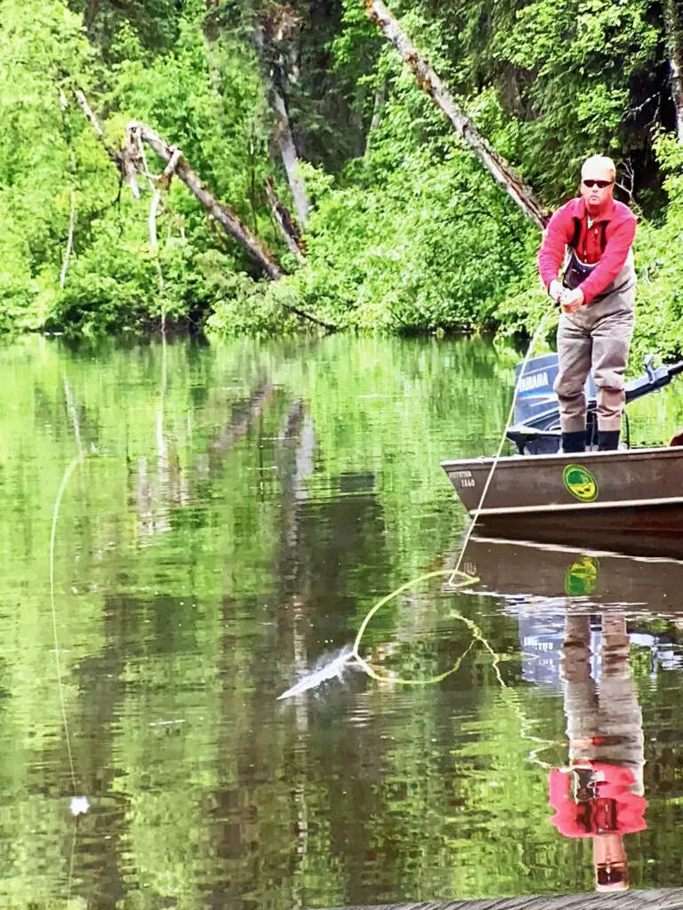 tal-adventures lodge guided salmon fishing jet boat fishing man jet boat fishing in alaska with tal-adventures lodge